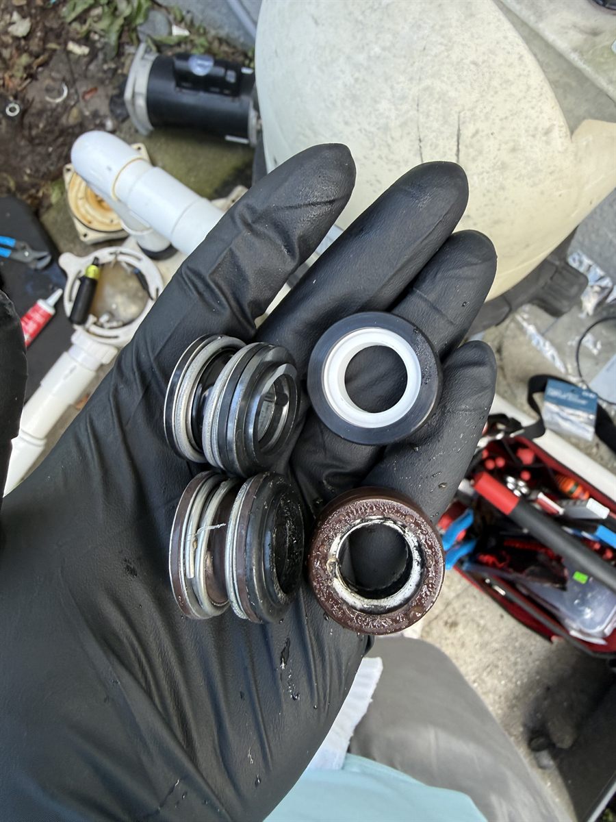 Worn versus new pump mechanical seals, side by side