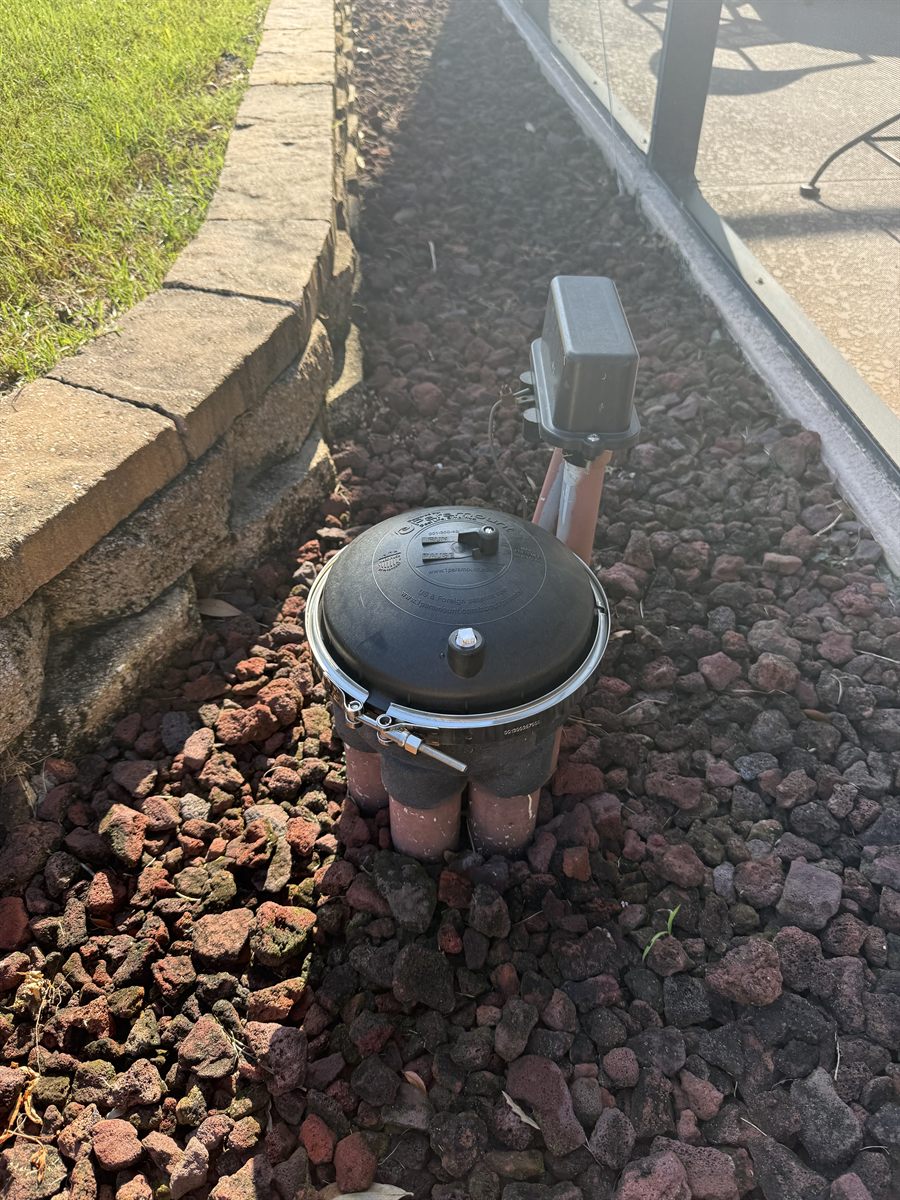 On-site pool equipment repair in Sarasota by Sundays Pools, technician working at the pad