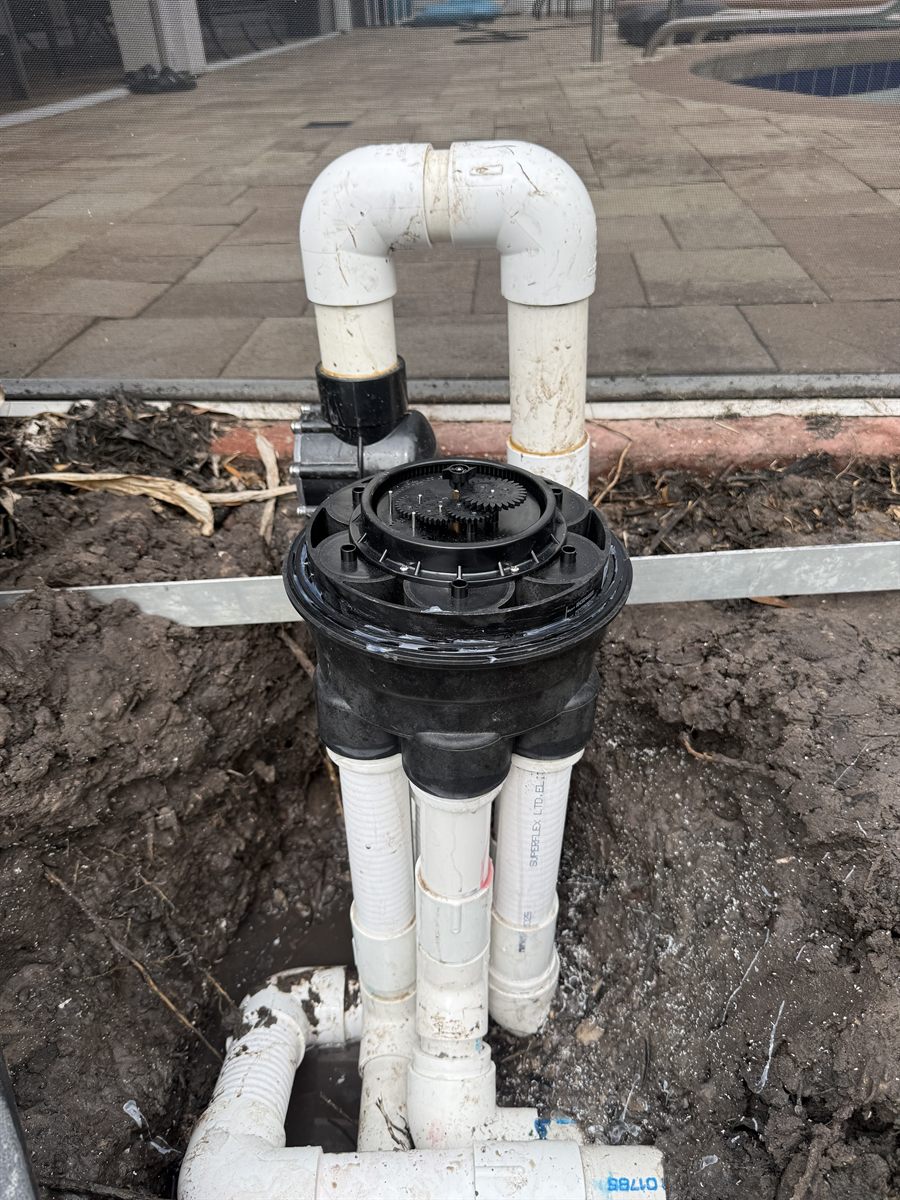 Pool multiport valve and manifold rebuild with fresh PVC plumbing in Bradenton by Sundays Pools